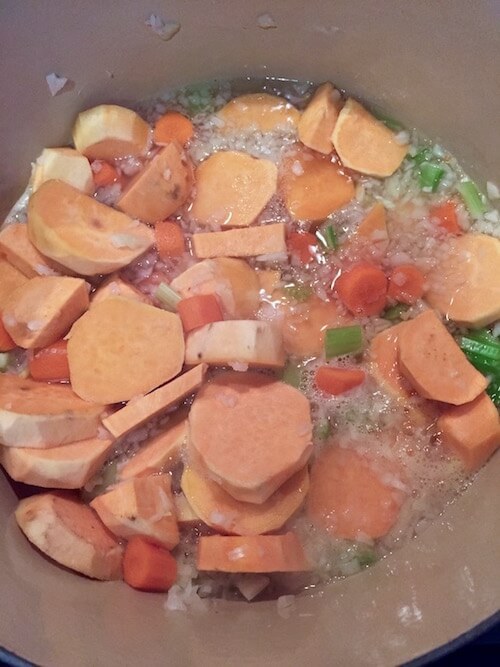 Sweet Potatoes, onion, celery in a pot with water | The Radiant Root