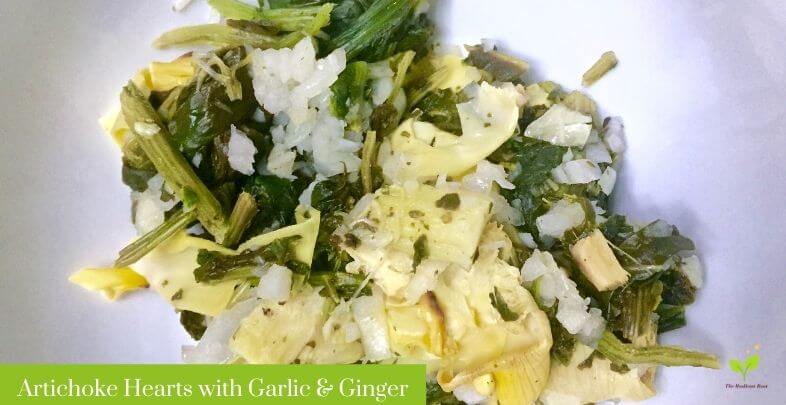 Garlic and Ginger Roasted Artichokes Hearts Frozen with Spinach on a white plate | The Radiant Root