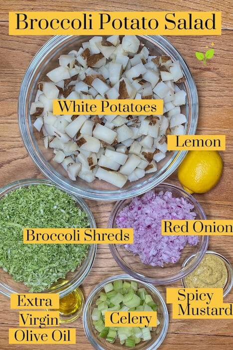 Broccoli Potato Salad ingredients in glass bowls on a wooden table white potatoes, lemon juice, shredded broccoli, red onion, olive oil, celery, spicy mustard| The Radiant Root