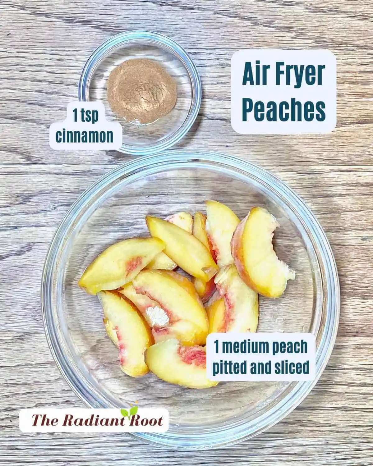 Air Fryer Peaches Recipe Ingredients in glass bowl on a wooden table a bowl of small bowl of sliced peaches and a small clear glass dish of cinnamon powder with the names spelled out next to them "peaches" and "cinnamon." | The Radiant Root