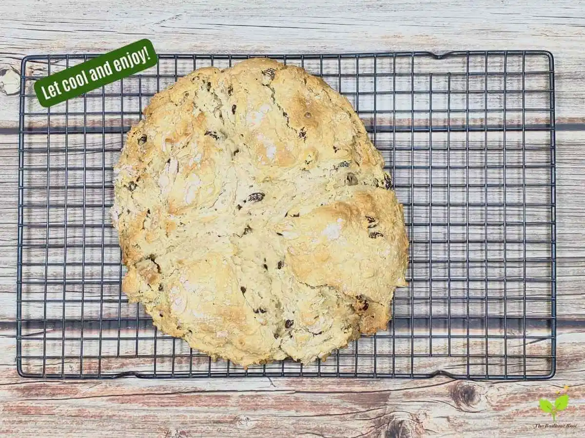 Gluten Free Irish Soda Bread Instruction 14 of 14: A finished cooked soda bread cooling on a wire cooling rack. | Gluten Free Irish Soda Bread | The Radiant Root