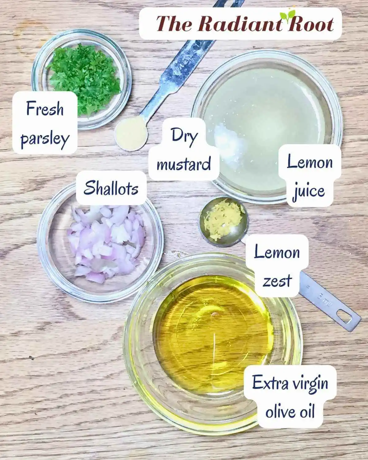 The top shows the words “The Radiant Root” on top of a wooden table with small glass bowls containing the ingredients for Lupini Beans Salad dressing ingredients : fresh parsley, dry mustard (in a measuring spoon), lemon juice, shallots diced, lemon zest (in a measuring spoon), and extra virgin olive oil. Next to each item is its name “fresh parsley,” “dry mustard,” “lemon juice,” “shallots,” “lemon zest,” and “extra virgin olive oil.” | What are lupini beans | The Radiant Root